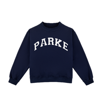 varsity mockneck flat lay -navy + white