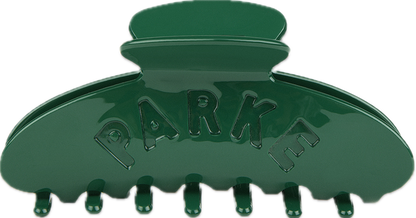green claw clip flat lay -green